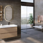 Stanza da bagno con pareti in cemento grezzo.