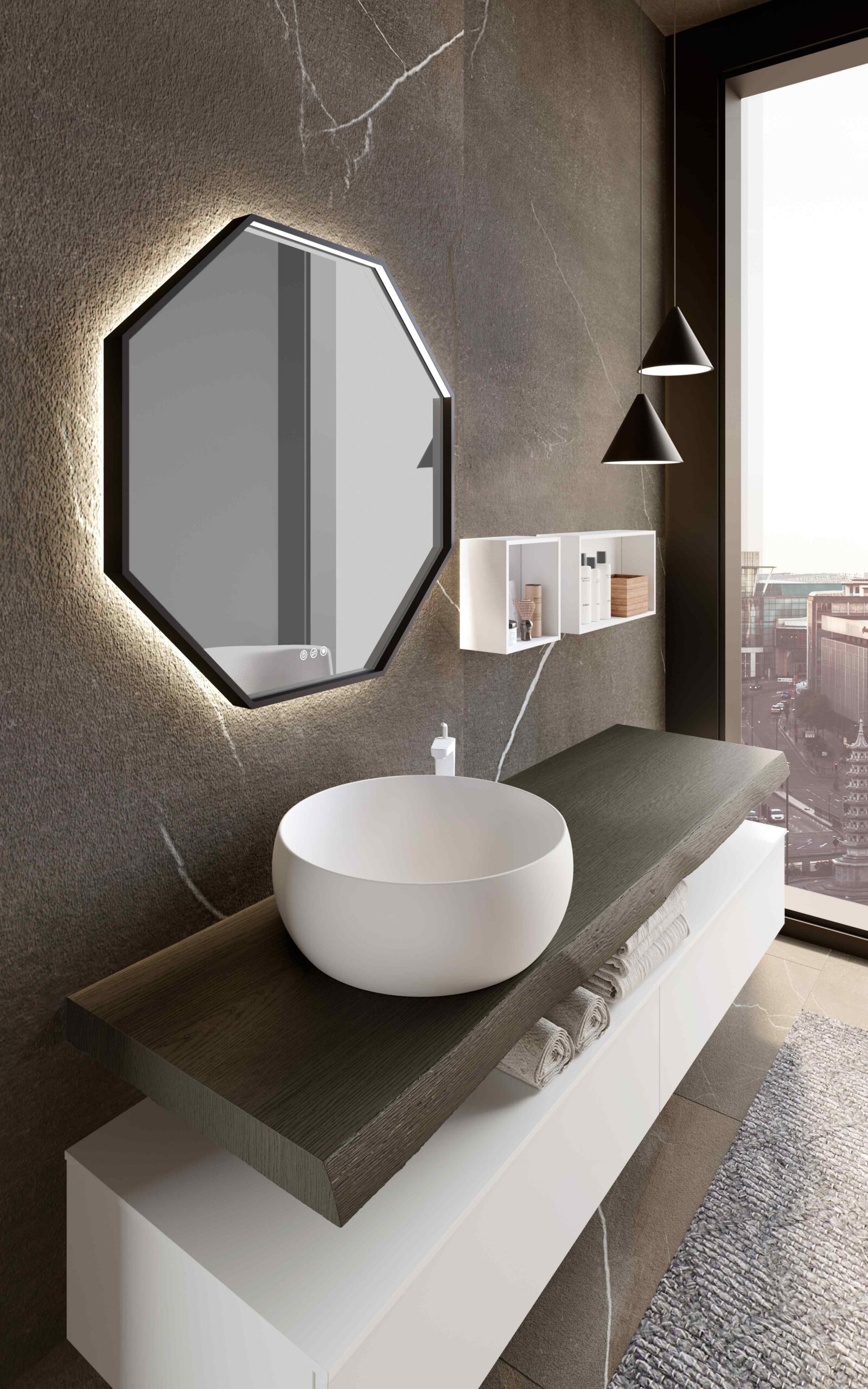 Lavabo d’appoggio rotondo bianco, abbinato a specchio retroilluminato in un bagno moderno.